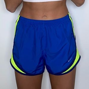 Nike Blue Athletic Shorts with Yellow Side Panel